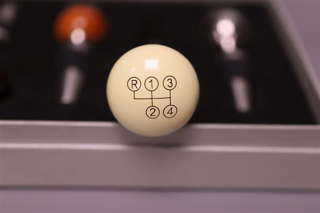 A cased novelty Mercedes Benz four-piece gear stick wine stopper set